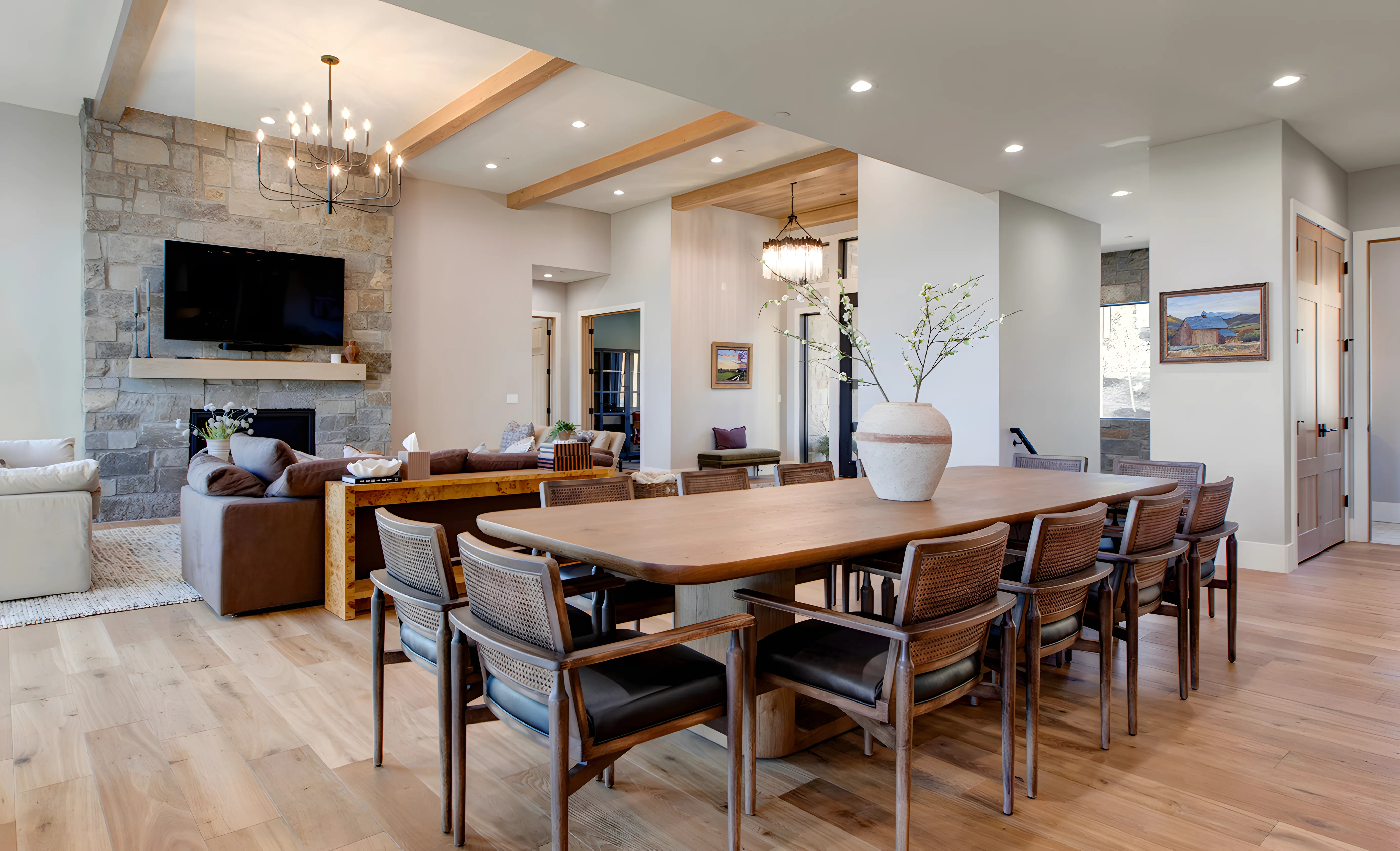 Mountain Modern Estate formal dining room with reclaimed stone fireplace